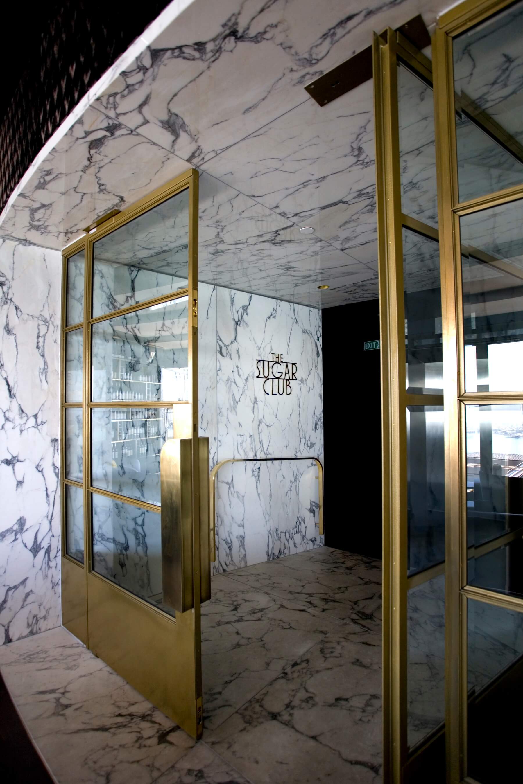 Metalier liquid metal brass doors; The Sugar Club; Liquid Metal India